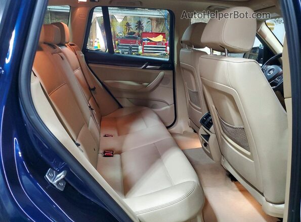 5UXWX9C55G0D68459 2016 BMW X3 Blue Rear interior view