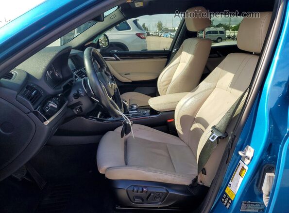 5UXXW7C32H0U26262 2017 BMW X4 Blue Vista interior delantera