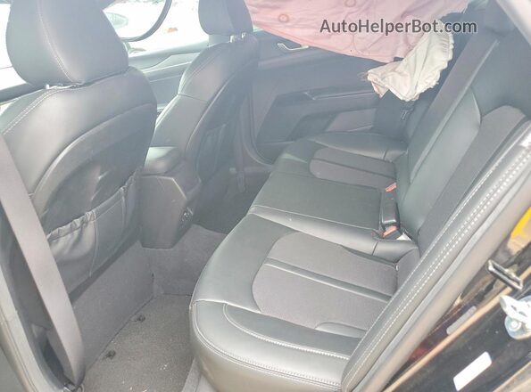 5XXG64J27RG262551 2024 KIA K5 Black Vista de los asientos traseros
