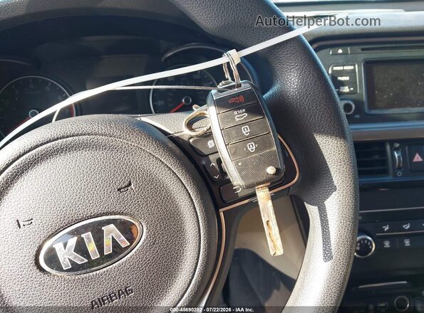 5XXGT4L39GG053422 2016 KIA OPTIMA Maroon Widok deski rozdzielczej