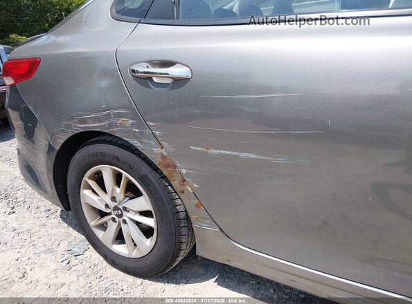 5XXGT4L39GG114896 2016 KIA OPTIMA Gray Widok wnętrza z tyłu