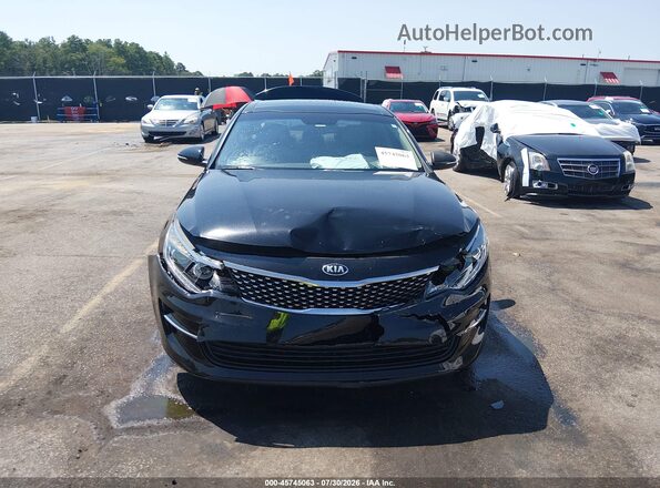 5XXGU4L31GG076514 2016 KIA OPTIMA Black Widok wnętrza z tyłu