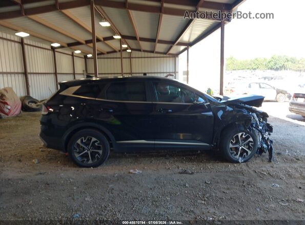 5XYK33AF5PG085877 2023 KIA SPORTAGE Black Սալոնի հետևի տեսք