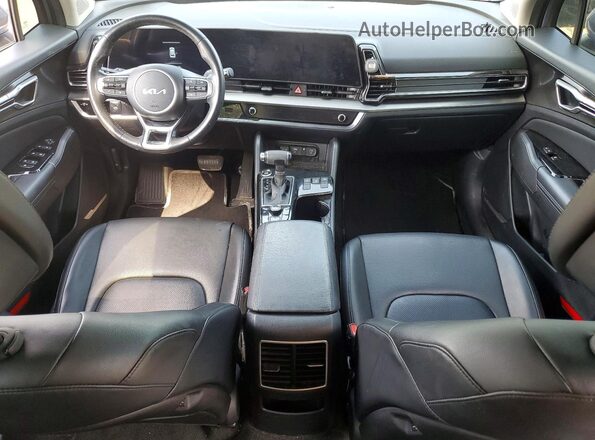 5XYK3CAF0PG030981 2023 KIA SPORTAGE Серый Вид панели приборов