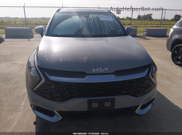 5XYK43AF6PG050990 2023 KIA SPORTAGE Gray ხელსაწყოთა პანელის ხედი