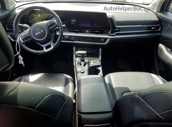 5XYK53AF1PG021667 2023 KIA SPORTAGE Gray Vista del salpicadero