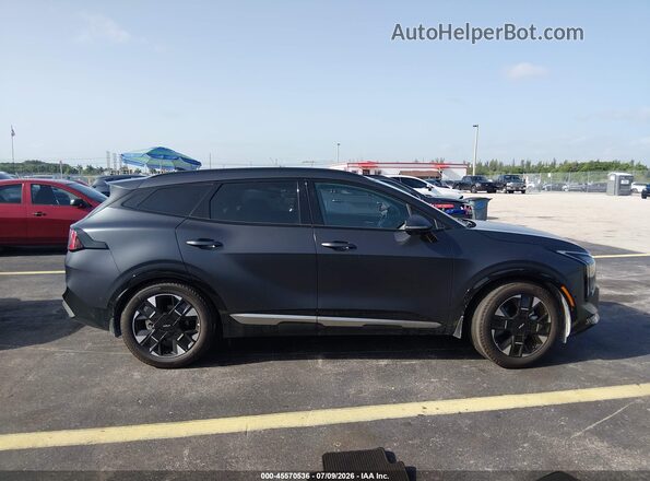 5XYK53DF4TG414083 2026 KIA SPORTAGE Black Widok wnętrza z tyłu