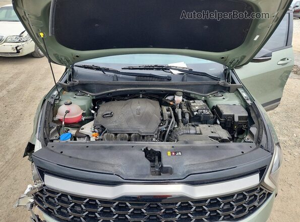 5XYK6CAFXPG138659 2023 KIA SPORTAGE Green Widok wnętrza z tyłu