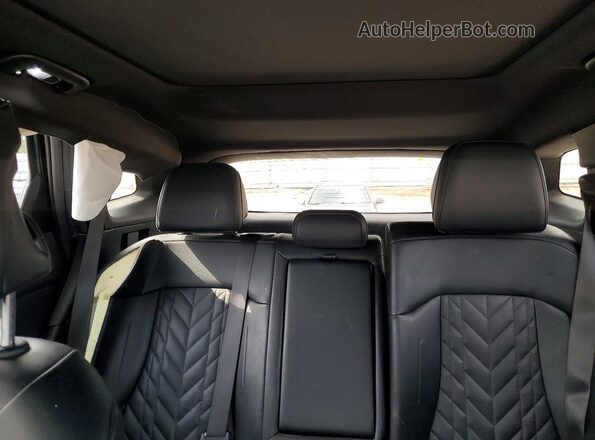 5XYK6CDF1RG199350 2024 KIA SPORTAGE Gray Vista de los asientos traseros