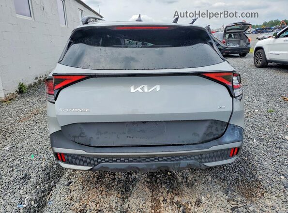 5XYK6CDFXRG223287 2024 KIA SPORTAGE Серый Вид сзади