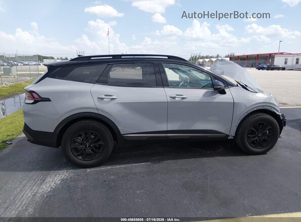 5XYK7CDF4RG144663 2024 KIA SPORTAGE Gray Սալոնի հետևի տեսք