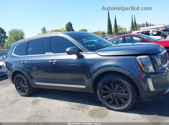 5XYP64HC1LG033168 2020 KIA TELLURIDE Gray Vista interior trasera