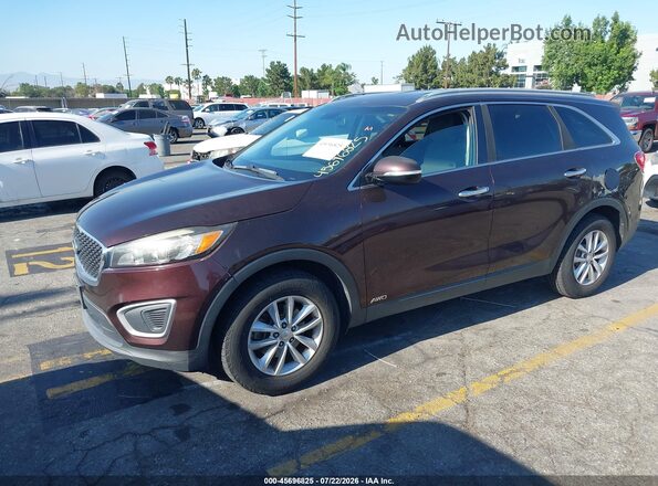 5XYPGDA31GG044443 2016 KIA SORENTO Burgundy Առջևի ձախ երեք քառորդ տեսարան