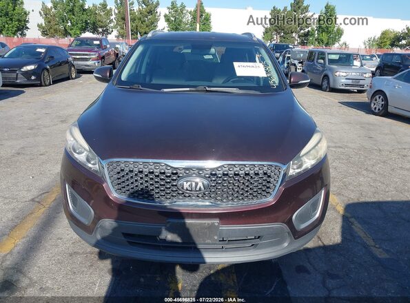 5XYPGDA31GG044443 2016 KIA SORENTO Burgundy Սարքավորումների վահանակի տեսք
