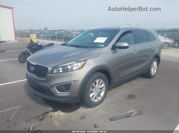 5XYPGDA34HG286404 2017 KIA SORENTO Gray Առջևի ձախ երեք քառորդ տեսարան