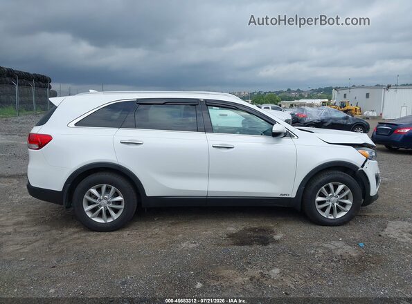 5XYPGDA39JG404825 2018 KIA SORENTO White Vista interior trasera