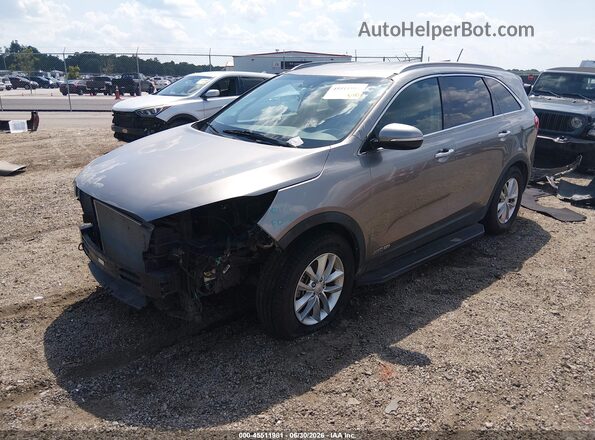 5XYPGDA57HG215053 2017 KIA SORENTO Gray Vista tres cuartos delantera izquierda