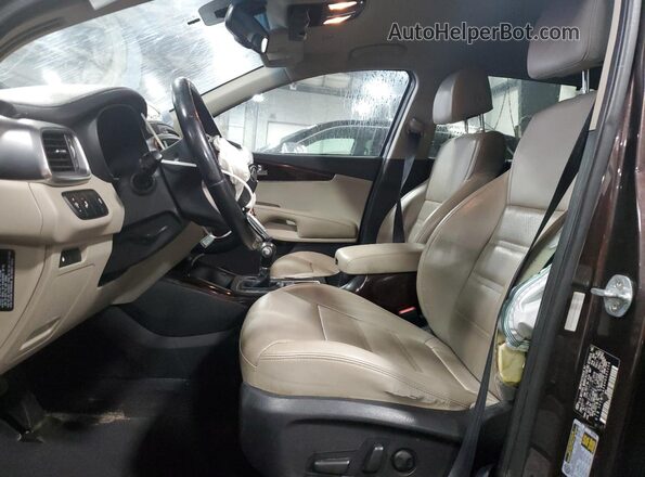 5XYPHDA56HG305159 2017 KIA SORENTO Коричневый Вид салона спереди