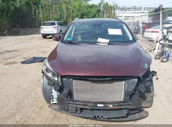 5XYPKDA57HG303518 2017 KIA SORENTO Burgundy უკანა სალონის ხედი