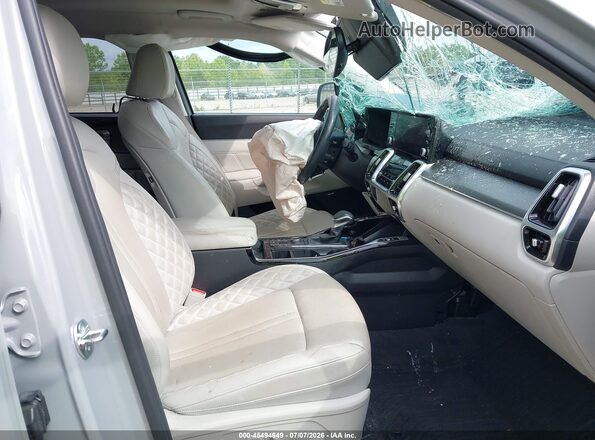 5XYRKDLF0PG239688 2023 KIA SORENTO Серый Вид салона спереди