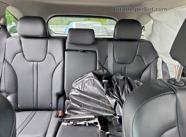 5XYRL4JC9SG388812 2025 KIA SORENTO Maroon Vista de los asientos traseros