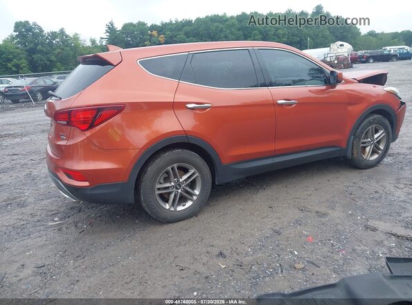 5XYZTDLB1HG438566 2017 HYUNDAI SANTA FE SPORT Оранжевый Задняя правая четверть