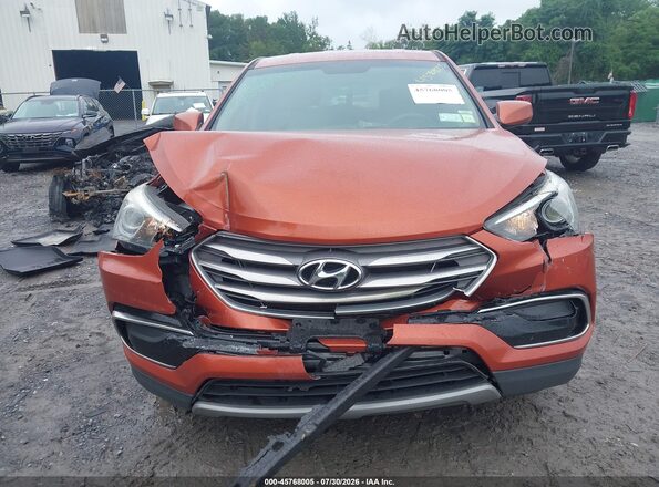 5XYZTDLB1HG438566 2017 HYUNDAI SANTA FE SPORT Оранжевый Вид спереди