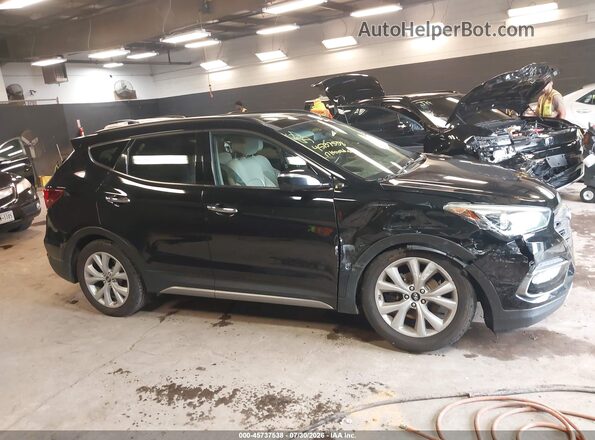 5XYZWDLA0HG384773 2017 HYUNDAI SANTA FE SPORT Black Rear interior view