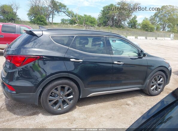 5XYZWDLAXHG464128 2017 HYUNDAI SANTA FE SPORT Черный Вид задней части салона
