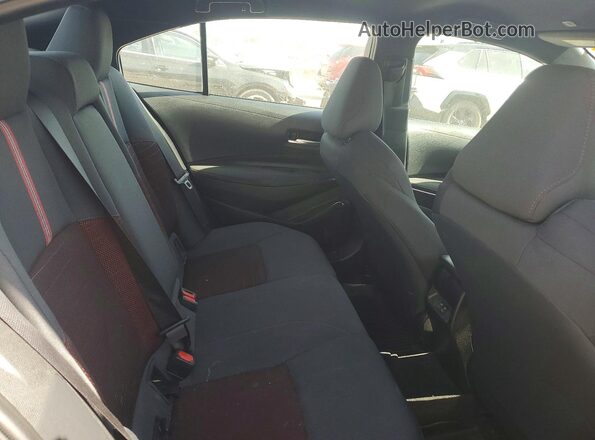 5YFB4MCE7RP203708 2024 TOYOTA COROLLA Black Vista de los asientos traseros