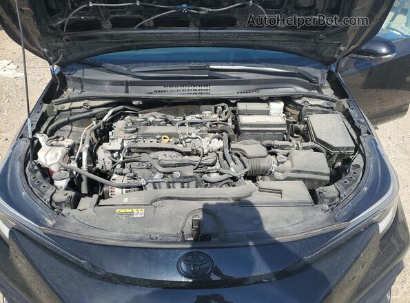 5YFB4MCE7RP203708 2024 TOYOTA COROLLA Black Vista interior trasera