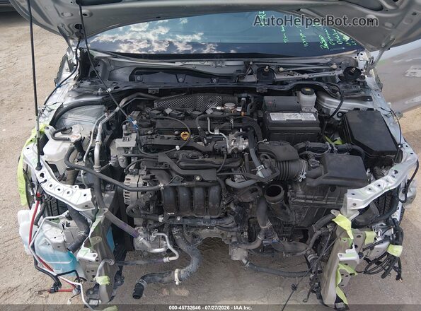 5YFB4MDE2PP067922 2023 TOYOTA COROLLA Серебряный Вид сзади