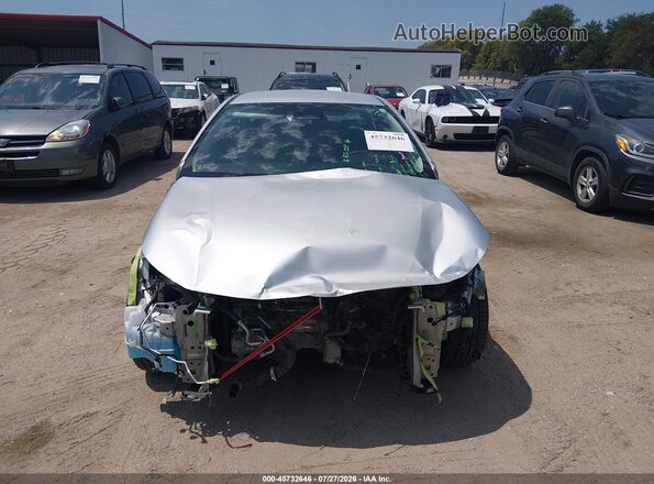 5YFB4MDE2PP067922 2023 TOYOTA COROLLA Серебряный Вид задней части салона
