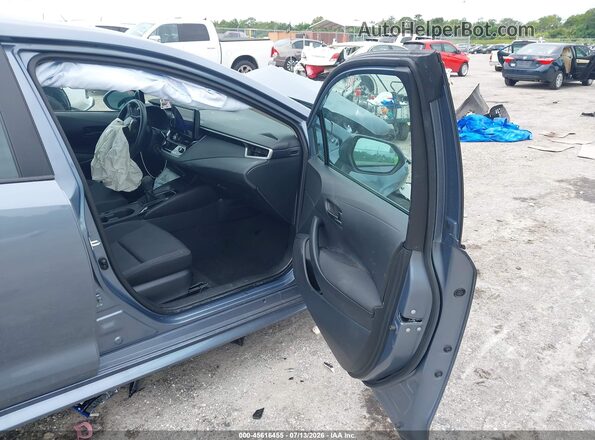 5YFB4MDE2SP297596 2025 TOYOTA COROLLA Gray Vista interior delantera