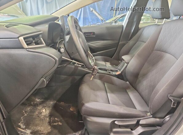 5YFB4MDE3PP003159 2023 TOYOTA COROLLA Серебряный Вид салона спереди