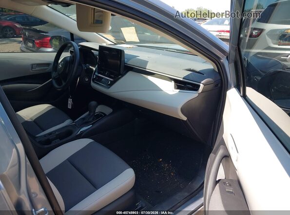 5YFB4MDE3TP444073 2026 TOYOTA COROLLA Gray Vista interior delantera