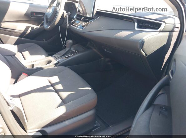 5YFB4MDE6PP065834 2023 TOYOTA COROLLA Gray Vista interior delantera