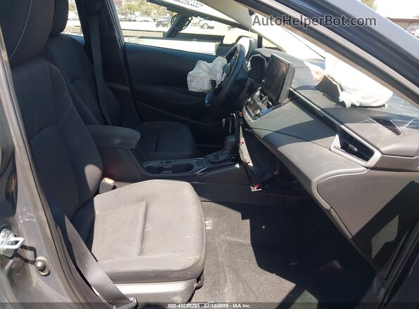 5YFB4MDE6SP302007 2025 TOYOTA COROLLA Gray Front interior view