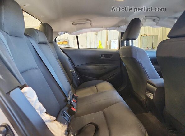 5YFB4MDE6TP465872 2026 TOYOTA COROLLA Silver Rear seats view