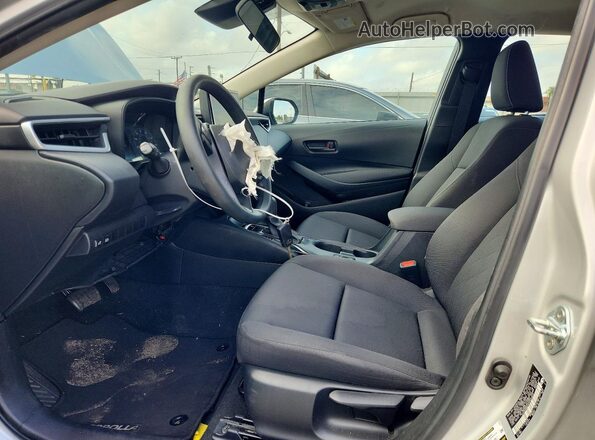 5YFB4MDEXPP055825 2023 TOYOTA COROLLA Серебряный Вид салона спереди