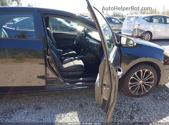 5YFBURHE0GP502332 2016 TOYOTA COROLLA Black Front interior view