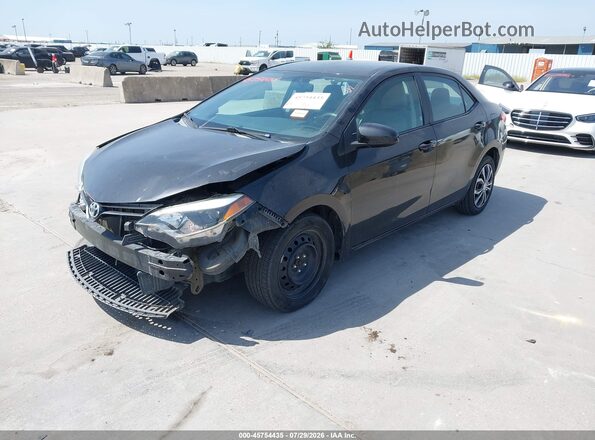 5YFBURHE1GP389670 2016 TOYOTA COROLLA Черный Передняя левая четверть