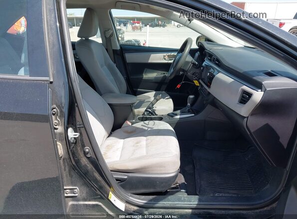 5YFBURHE1GP389670 2016 TOYOTA COROLLA Черный Вид салона спереди