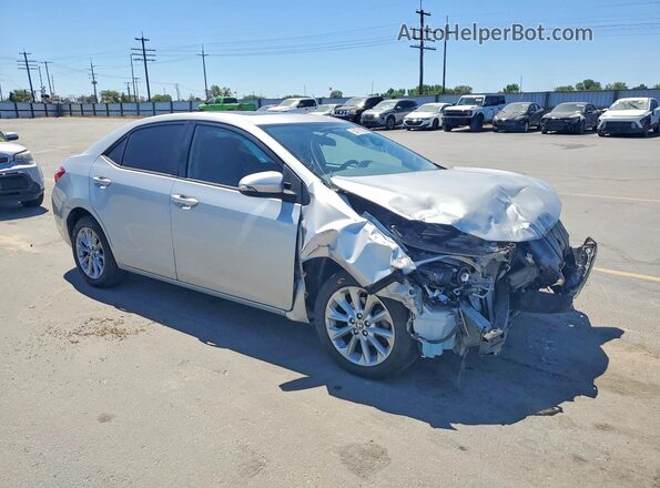 5YFBURHE1GP400313 2016 TOYOTA COROLLA Серебряный Передняя правая четверть
