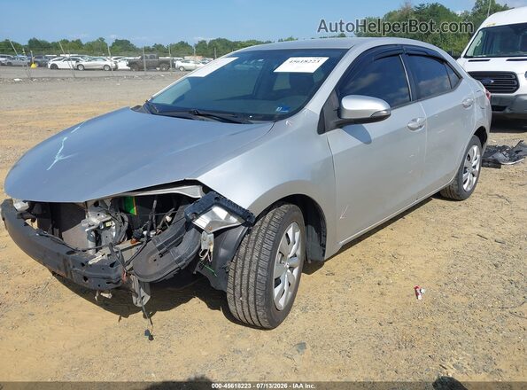 5YFBURHE1GP476288 2016 TOYOTA COROLLA Silver წინა მარცხენა ხედი სამი მეოთხედიდან