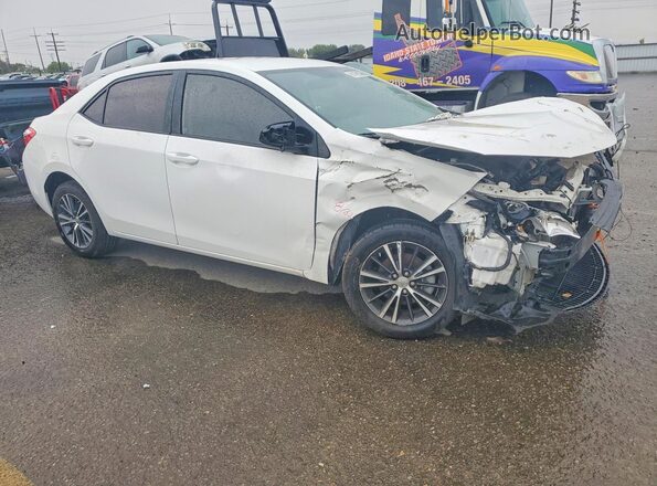 5YFBURHE1GP539079 2016 TOYOTA COROLLA White Front right