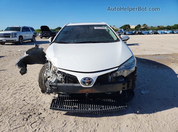 5YFBURHE1JP778008 2018 TOYOTA COROLLA White Vista frontal