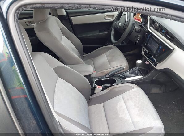 5YFBURHE1KP861844 2019 TOYOTA COROLLA Black Front interior view