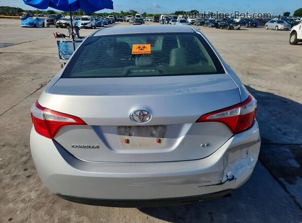 5YFBURHE2GP406430 2016 TOYOTA COROLLA Silver Vista trasera