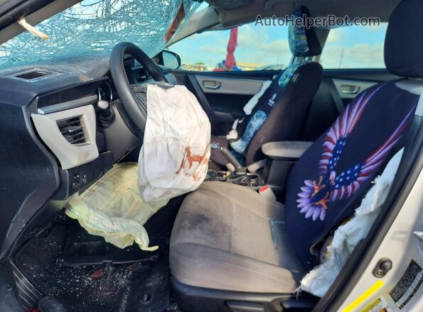5YFBURHE2GP406430 2016 TOYOTA COROLLA Silver Vista interior delantera
